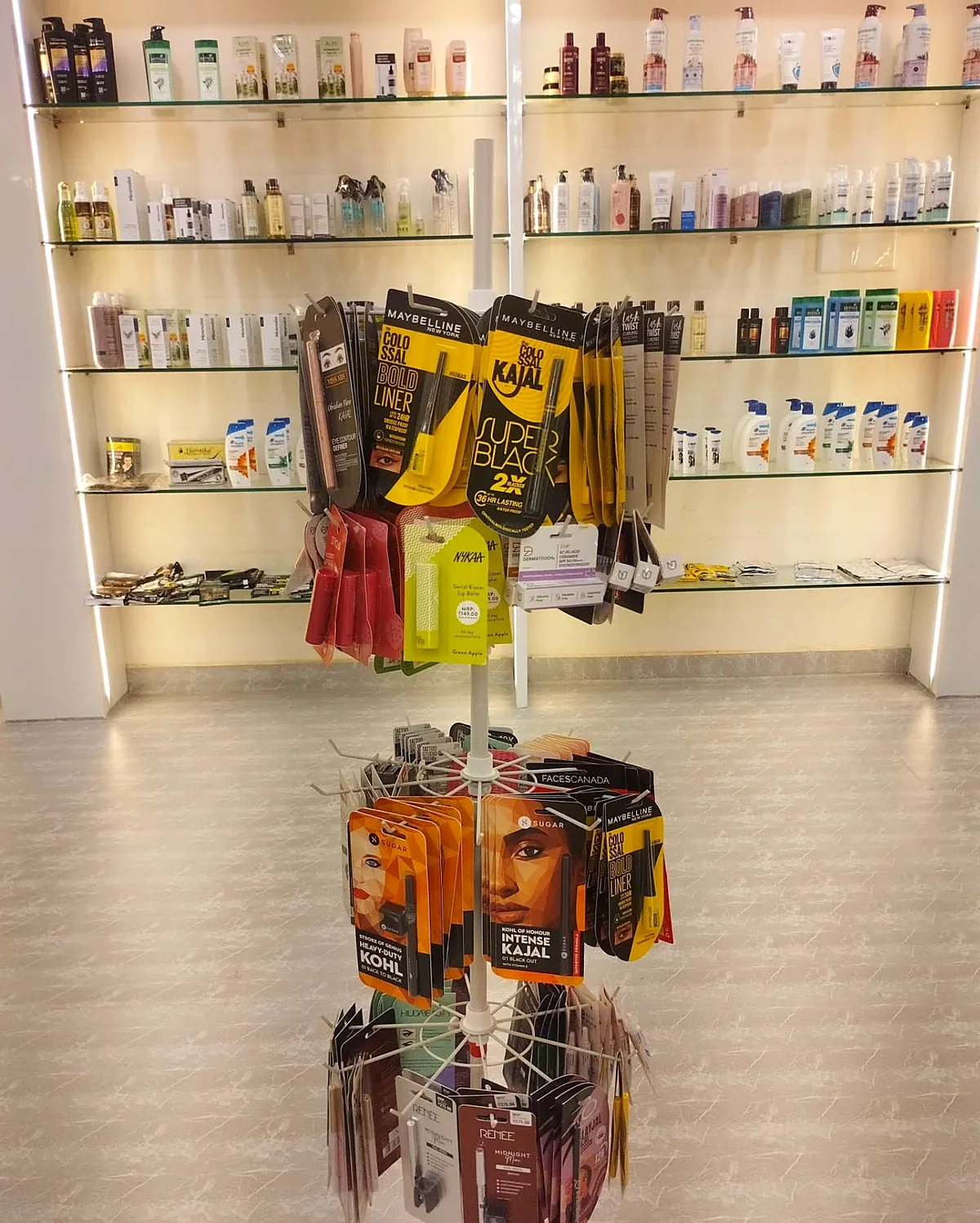 Kajal and eyeliner spinner rack